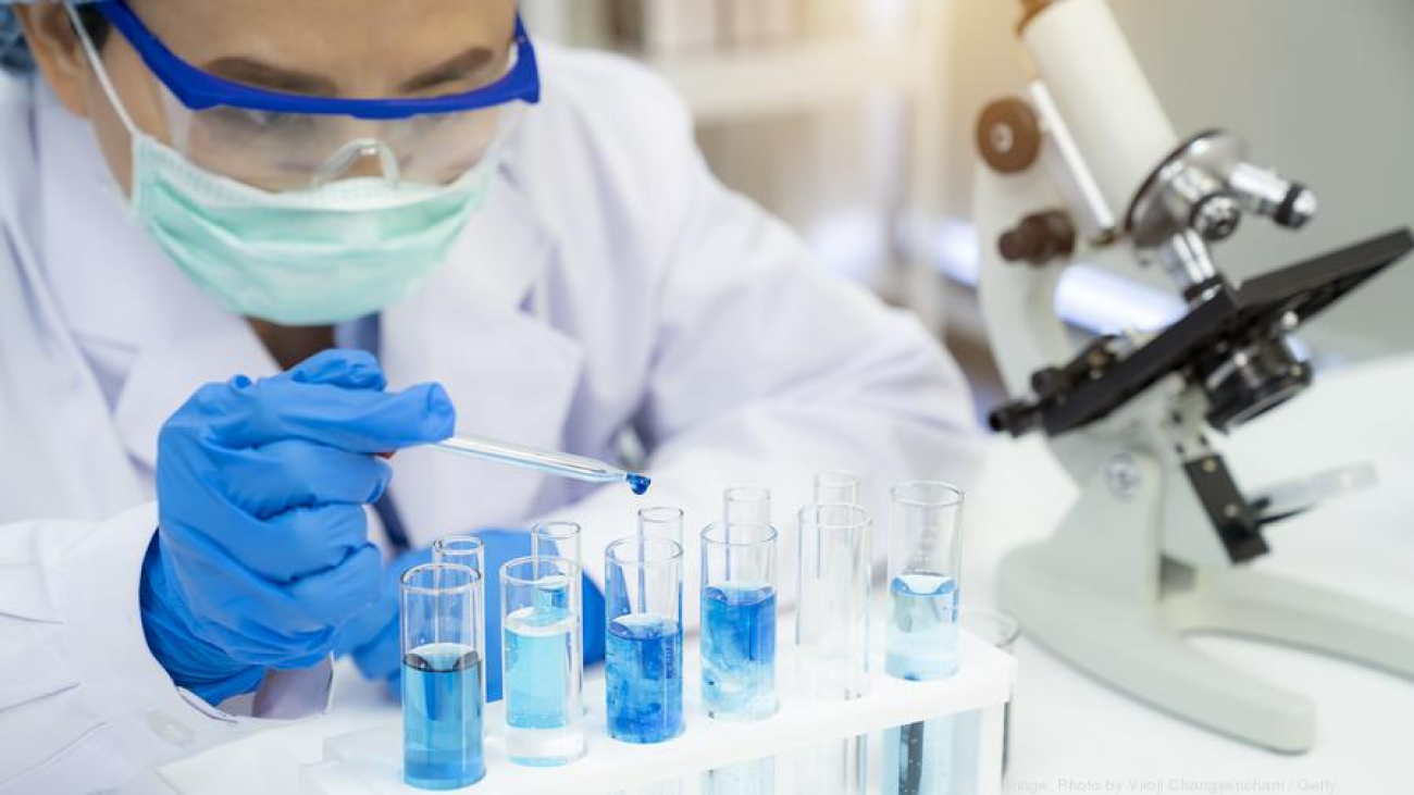 Laboratory technicians at work.